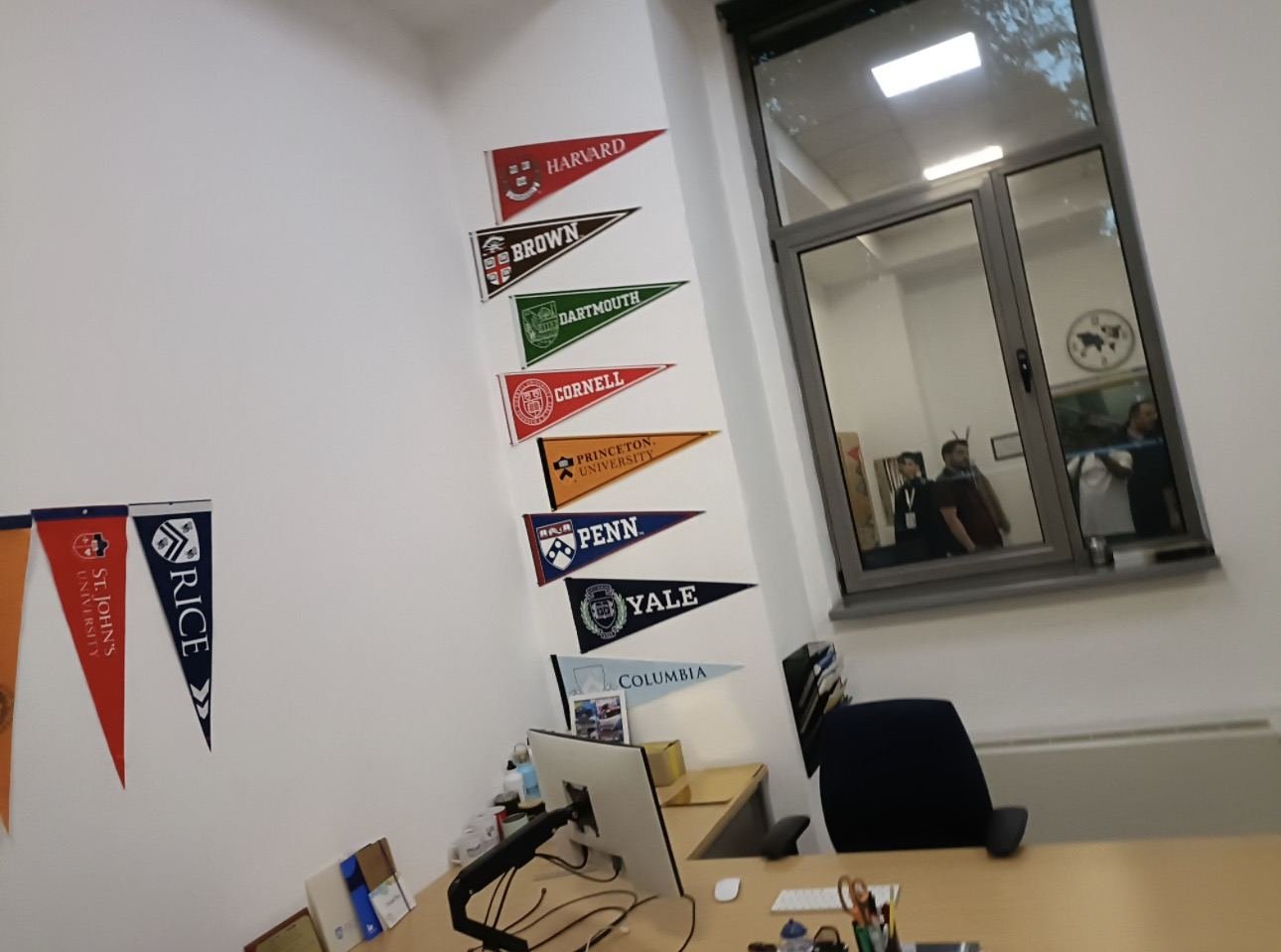 Counselling office with university pennants